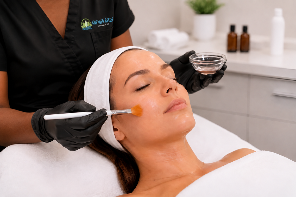 Esthetician applying facial peels at Kneaded Relief Massage & Spa